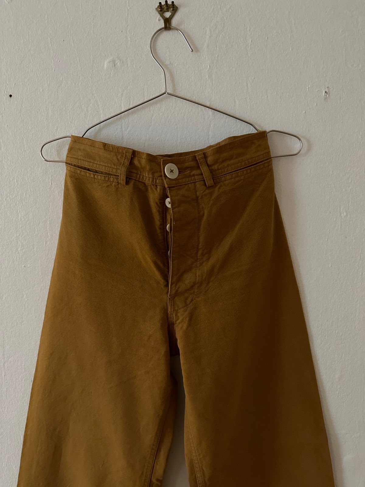 jesse kamm sailor pant tobacco Pants Sale at Need Supply Co. 2020 high on the waist with a straight leg and double coin pocket construction Jesse Kamm Sailor Pant in