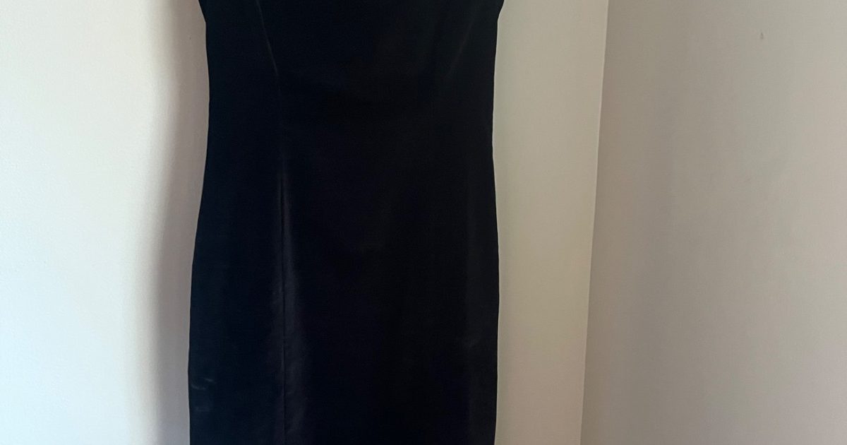 cesarina dress from den A night out with @champagnemani in our '90s-inspired DEN Heirloom Cesarina Dressan Italian cotton velvet treasure ~ Image description // Imani wears a cap-sleeved black velvet sheath dress with